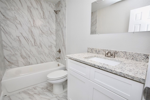 full bathroom featuring toilet, tiled shower / bath combo, and vanity