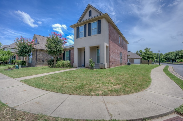 view of front of home with a front lawn