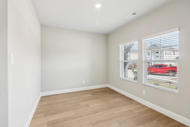 empty room with light wood-type flooring