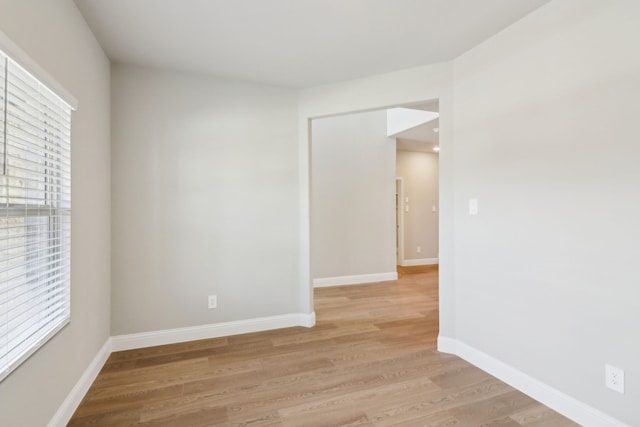 empty room with light wood-type flooring