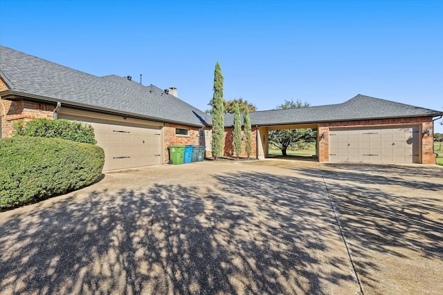 view of home's exterior featuring a garage