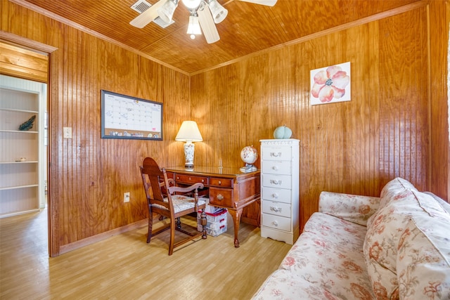 home office with built in shelves, wooden walls, hardwood / wood-style flooring, and wooden ceiling