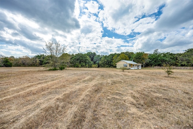 1345 Fm 1563, Wolfe City, TX 75496 - view of yard with a view of countryside and a wooded view