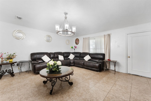 tiled living room with a notable chandelier