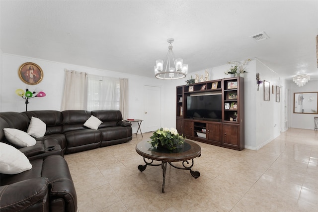 tiled living room with a chandelier