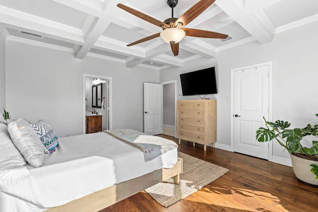 bedroom featuring beam ceiling, ensuite bath, ceiling fan, and dark hardwood / wood-style floors