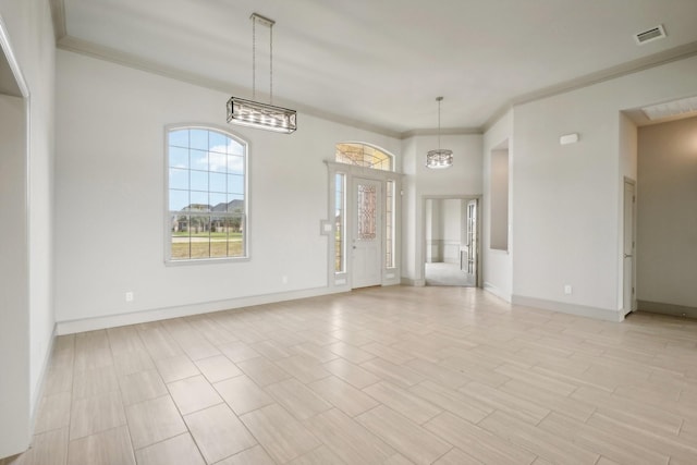 interior space featuring light wood-type flooring, an inviting chandelier, and ornamental molding