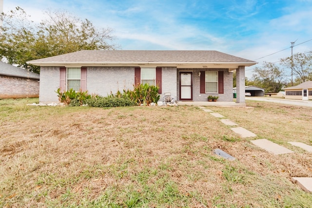 ranch-style house with a front lawn