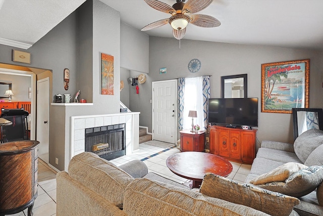 tiled living room featuring ceiling fan and lofted ceiling