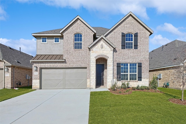 french country home featuring a garage and a front lawn