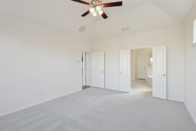 unfurnished bedroom with ceiling fan, high vaulted ceiling, and light colored carpet