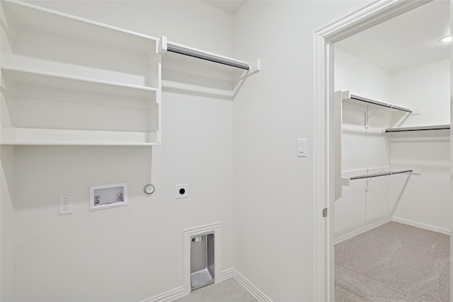 laundry area with gas dryer hookup, electric dryer hookup, hookup for a washing machine, and light colored carpet