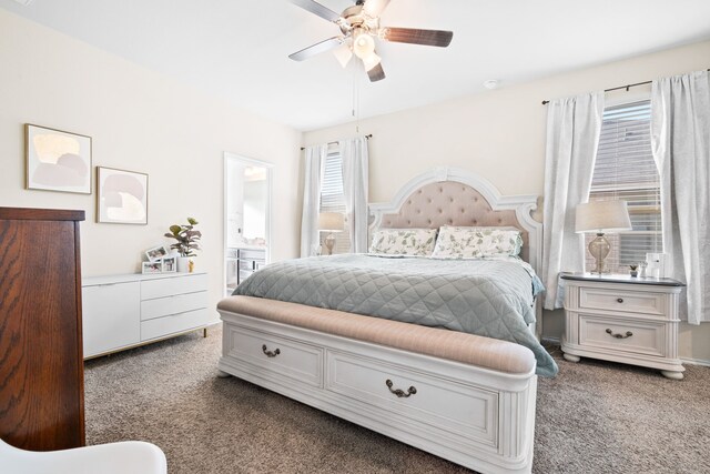 bedroom featuring carpet flooring, ceiling fan, and ensuite bathroom