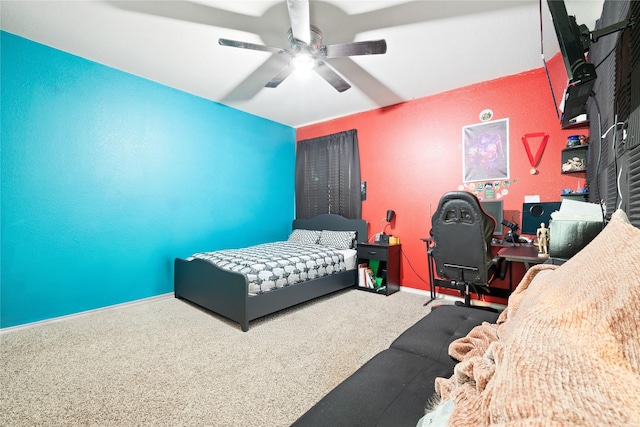 bedroom with ceiling fan and carpet floors