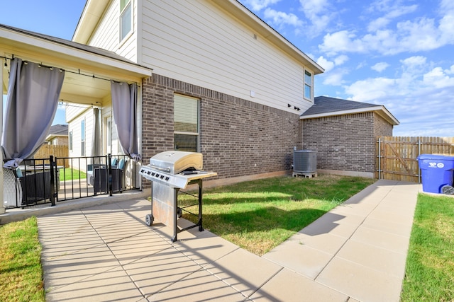 view of patio / terrace featuring central air condition unit and grilling area