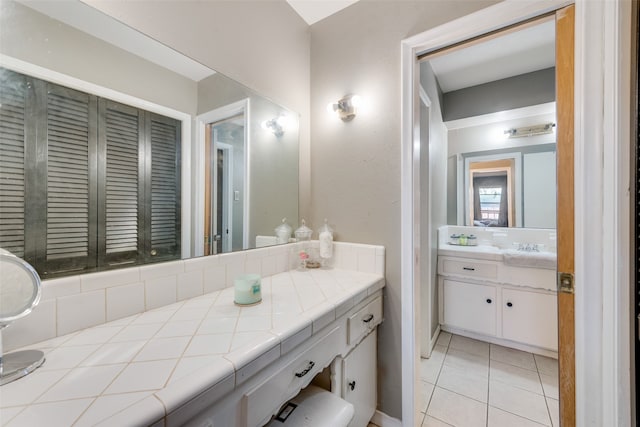 bathroom featuring vanity and tile patterned flooring