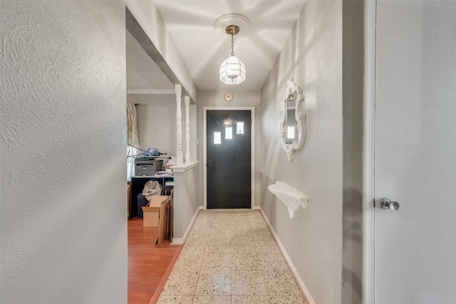 doorway to outside featuring hardwood / wood-style flooring