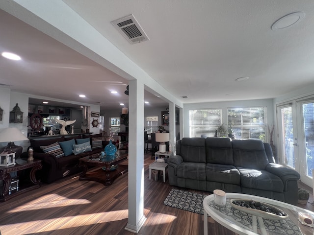 living room featuring dark hardwood / wood-style floors