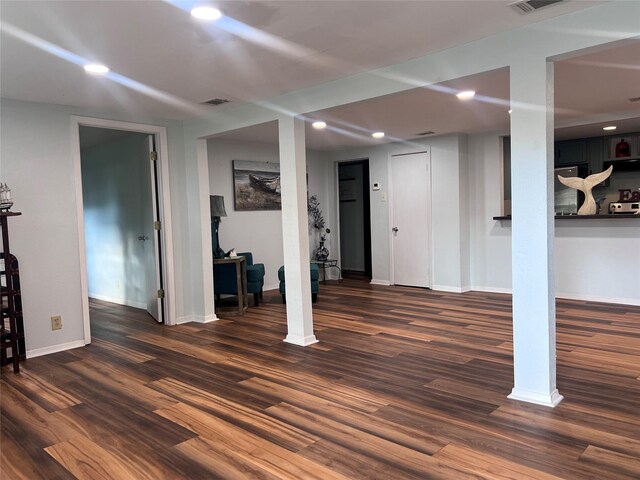 488 Briggs Blvd, East Tawakoni, TX 75472 - below grade area with dark wood finished floors, recessed lighting, and baseboards