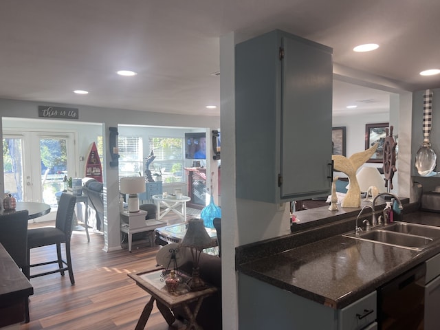 488 Briggs Blvd, East Tawakoni, TX 75472 - kitchen with a sink, dark countertops, healthy amount of natural light, dishwasher, and recessed lighting