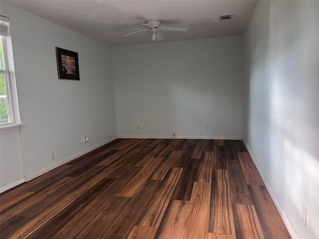 488 Briggs Blvd, East Tawakoni, TX 75472 - unfurnished room featuring ceiling fan, dark wood-type flooring, and baseboards