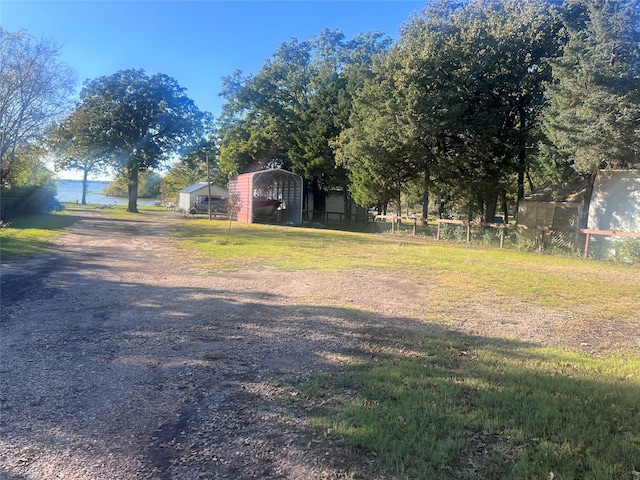 view of yard featuring a carport