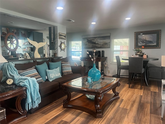 488 Briggs Blvd, East Tawakoni, TX 75472 - living room with wood finished floors, plenty of natural light, and recessed lighting