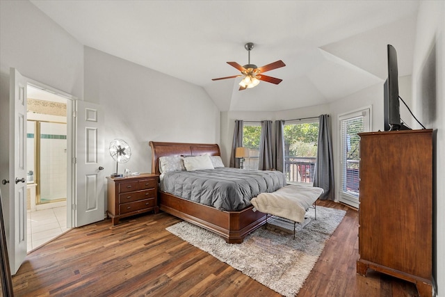 bedroom featuring lofted ceiling, ensuite bath, access to outside, dark hardwood / wood-style floors, and ceiling fan