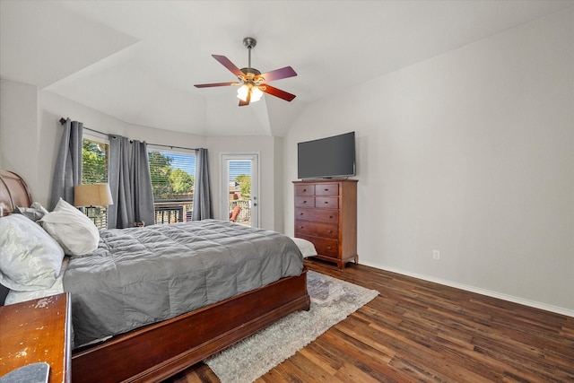 bedroom with multiple windows, vaulted ceiling, dark wood-type flooring, and ceiling fan