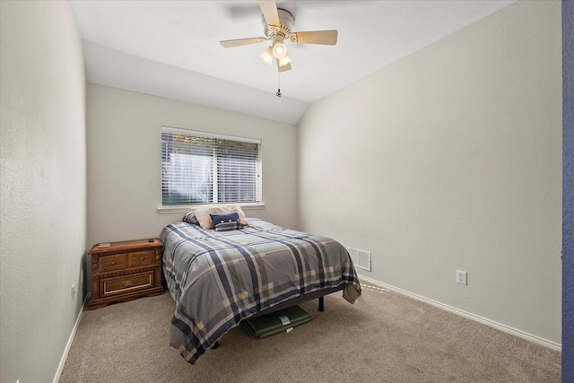 carpeted bedroom featuring ceiling fan and lofted ceiling