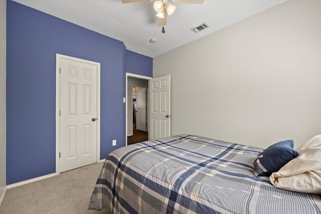 bedroom with ceiling fan and carpet floors