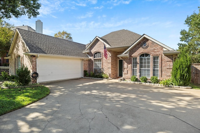 view of front of property with a garage