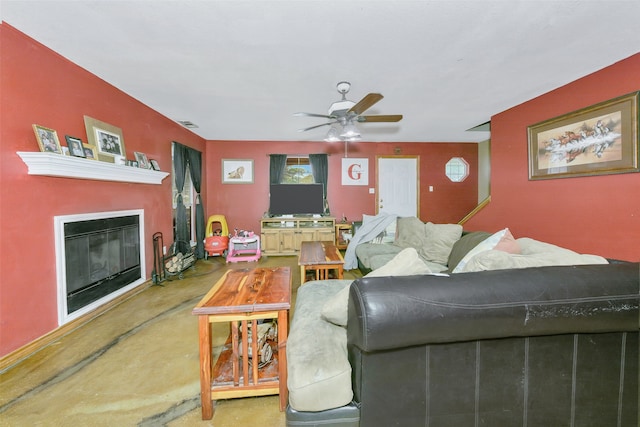 living room featuring carpet flooring and ceiling fan