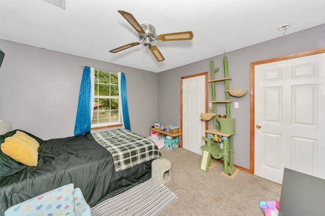 bedroom featuring carpet flooring and ceiling fan