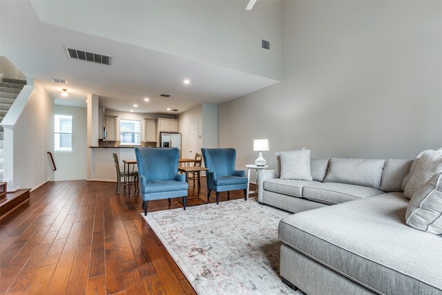 living room featuring dark hardwood / wood-style flooring