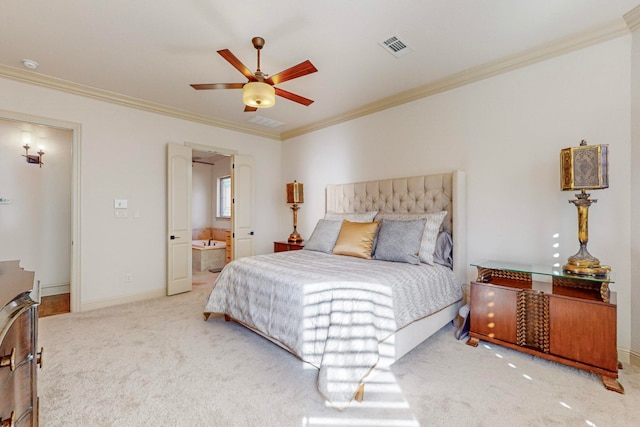 carpeted bedroom with ensuite bathroom, ceiling fan, and crown molding