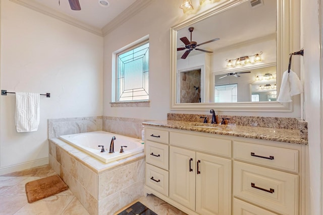 bathroom featuring vanity, tiled bath, ceiling fan, and crown molding