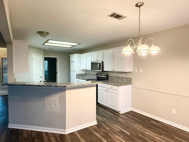 1501 Cat Mountain Trl, Keller, TX 76248 - kitchen with dark stone counters, dark wood finished floors, visible vents, baseboards, and appliances with stainless steel finishes