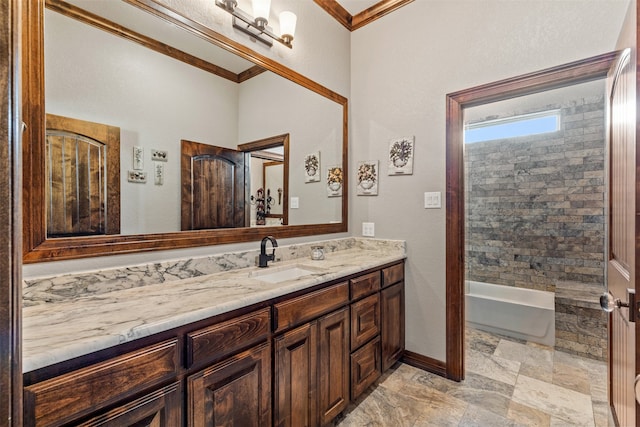 bathroom with vanity and ornamental molding