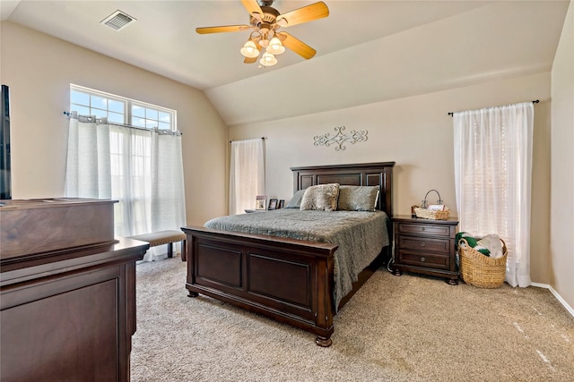 carpeted bedroom featuring ceiling fan and lofted ceiling