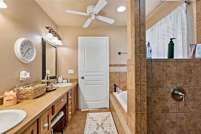 bathroom with plus walk in shower, vanity, tile patterned flooring, and ceiling fan