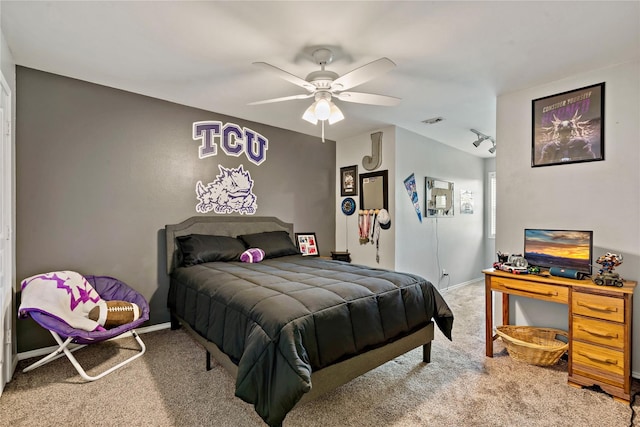 carpeted bedroom with ceiling fan