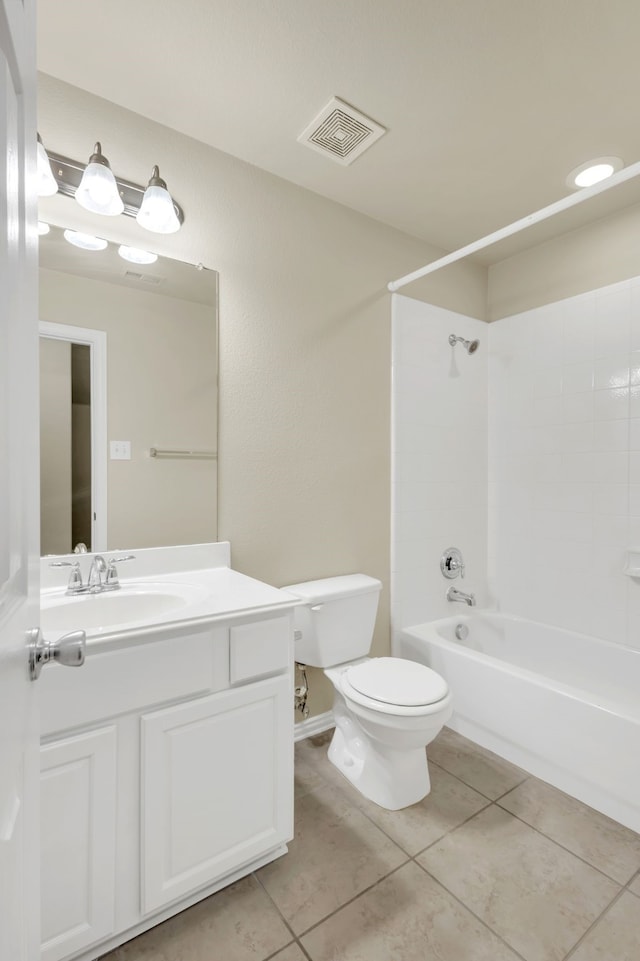 full bathroom featuring tub / shower combination, tile patterned flooring, vanity, and toilet