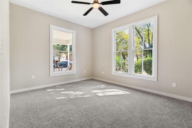 unfurnished room featuring carpet and ceiling fan