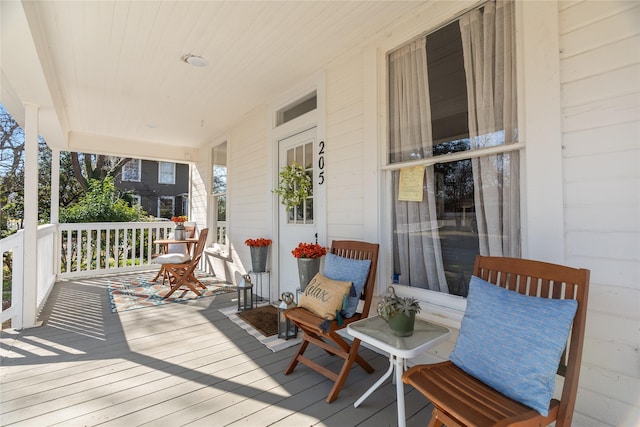 deck with covered porch