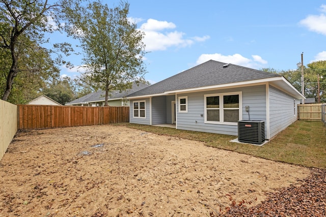 back of property featuring central AC unit