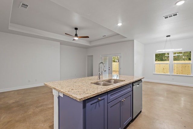 kitchen featuring a center island with sink, hanging light fixtures, sink, stainless steel dishwasher, and light stone countertops