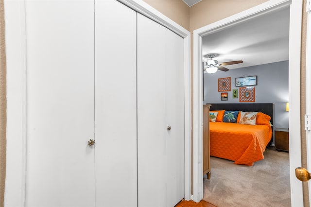 carpeted bedroom featuring ceiling fan