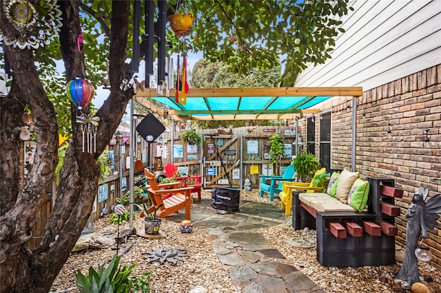 view of patio featuring a pergola