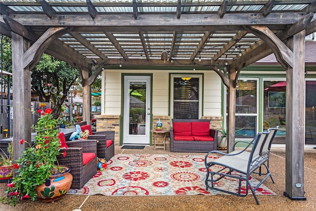 view of patio featuring an outdoor hangout area and a pergola